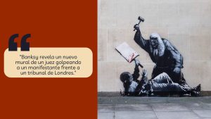 Banksy presenta un nuevo mural de un juez golpeando a un manifestante frente a un tribunal de Londres